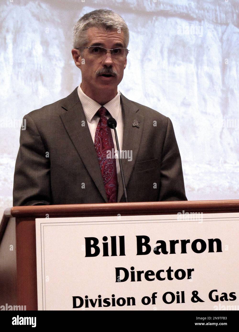 Alaska Oil and Gas Division director Bill Barron announces bids from