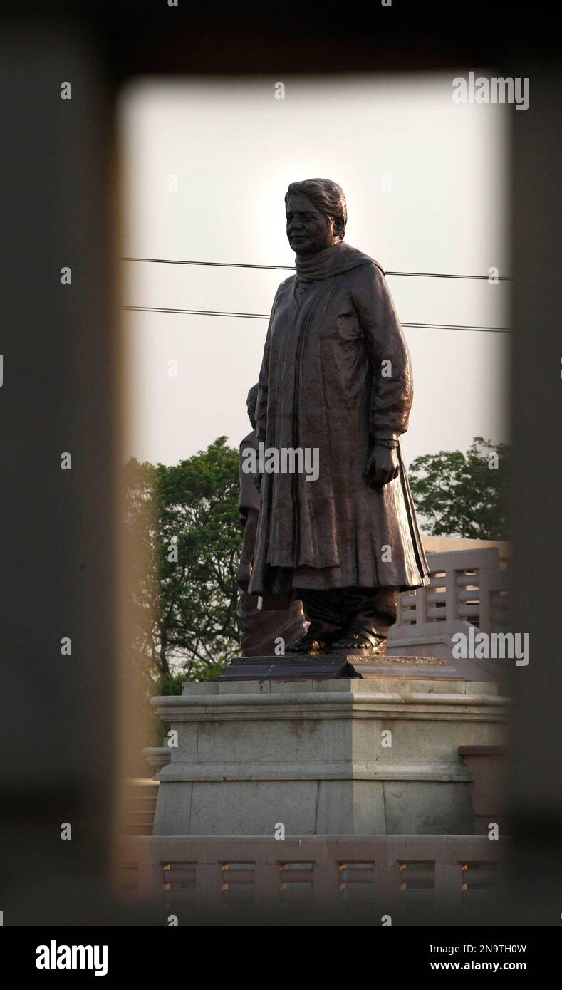 A statue of former Uttar Pradesh state chief minister Mayawati stands at Ambedkar Park in Noida, on the outskirts of New Delhi, India, Wednesday, May 16, 2012. The new government in Uttar Pradesh state is investigating millions it says were misappropriated by Mayawati's government as it built statues and monuments into parks honoring the contribution of dalits, the lowest Hindu caste, to the nation, including the father of the constitution, B.R. Ambedkar. (AP Photo/Manish Swarup) Stock Photo