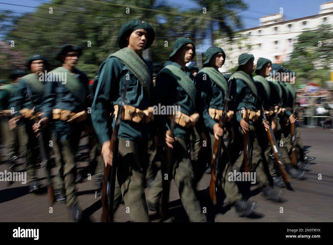 Infantry soldiers march in uniforms from The Chaco War, Paraguay's war with  Bolivia in the 1930's, during an Independence Day parade in Asuncion,  Paraguay, Monday, May 14, 2012. (AP Photo/Jorge Saenz Stock
