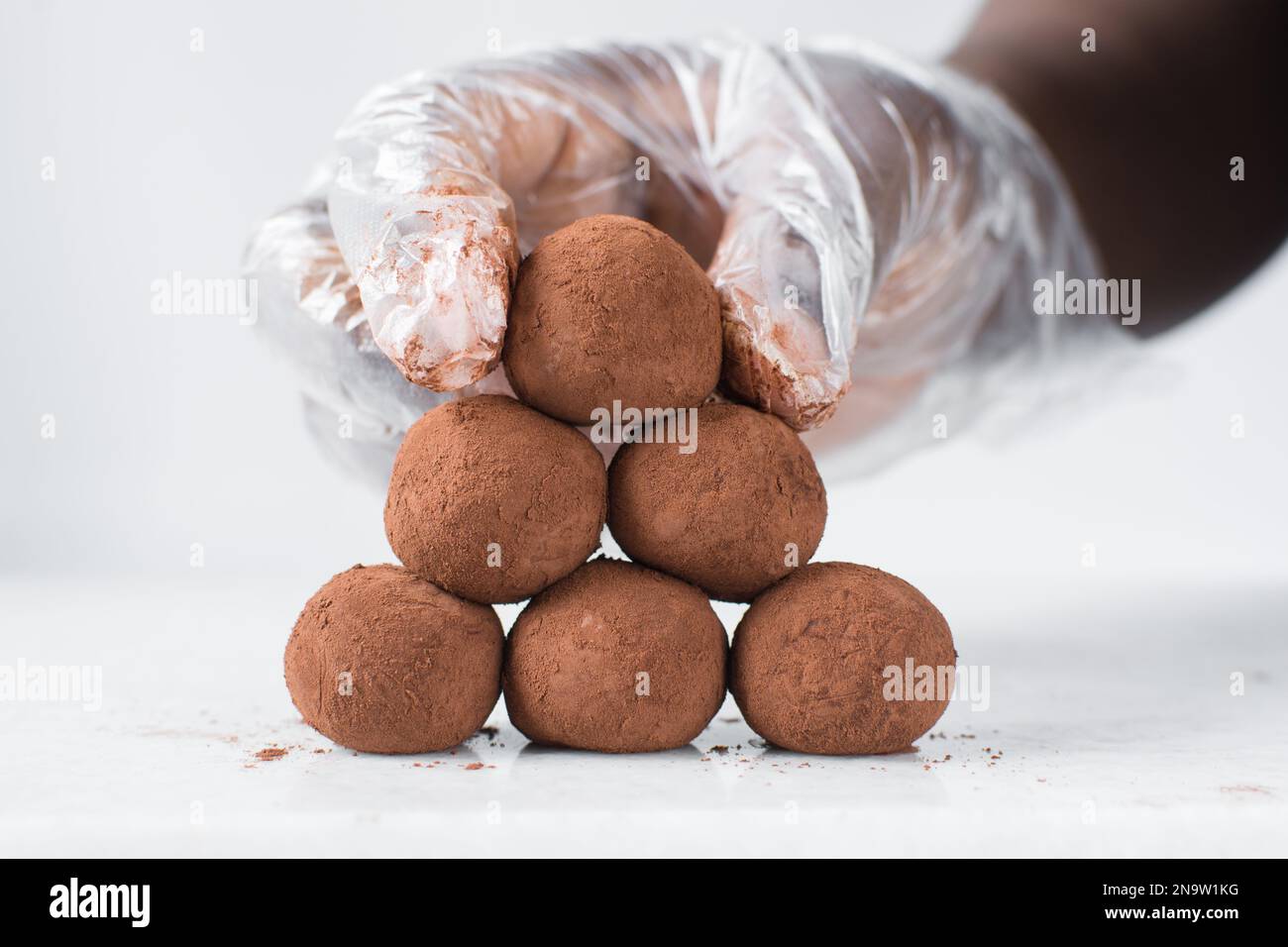 chocolate truffles covered in cocoa powder, homemade chocolate bonbons