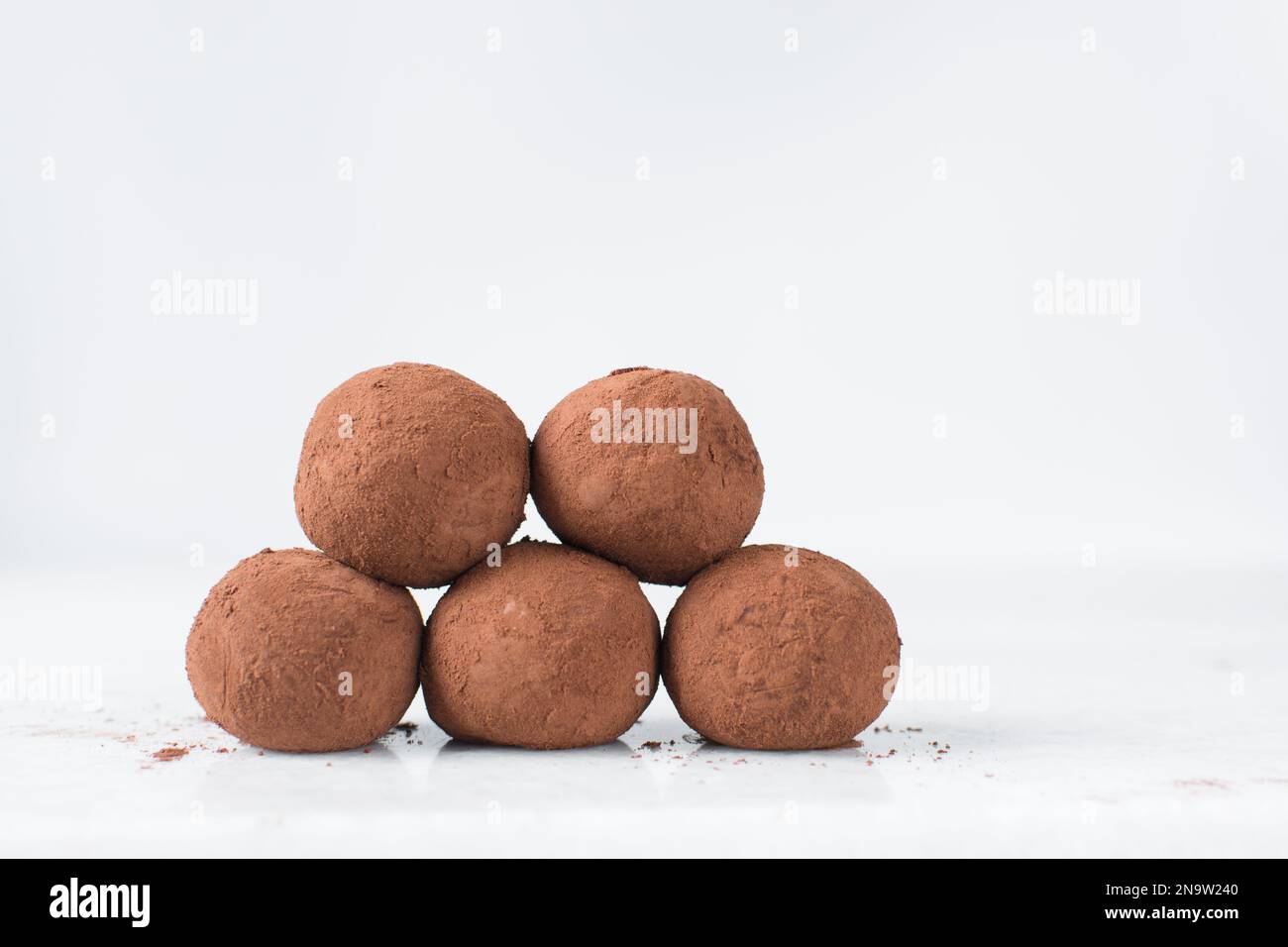 chocolate truffles covered in cocoa powder, homemade chocolate bonbons