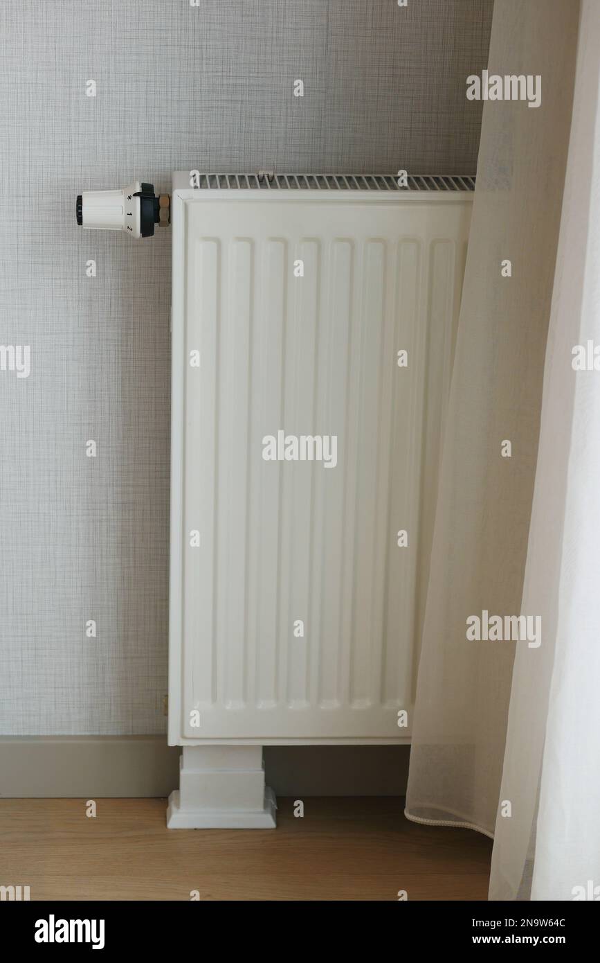 heating radiator under window in the room Stock Photo Alamy