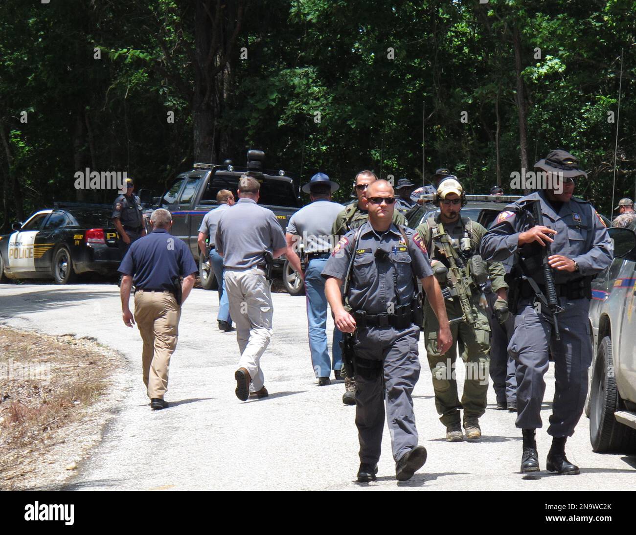 ALTERNATE CROP OF RPAS102 FBI agents and Mississippi state troopers
