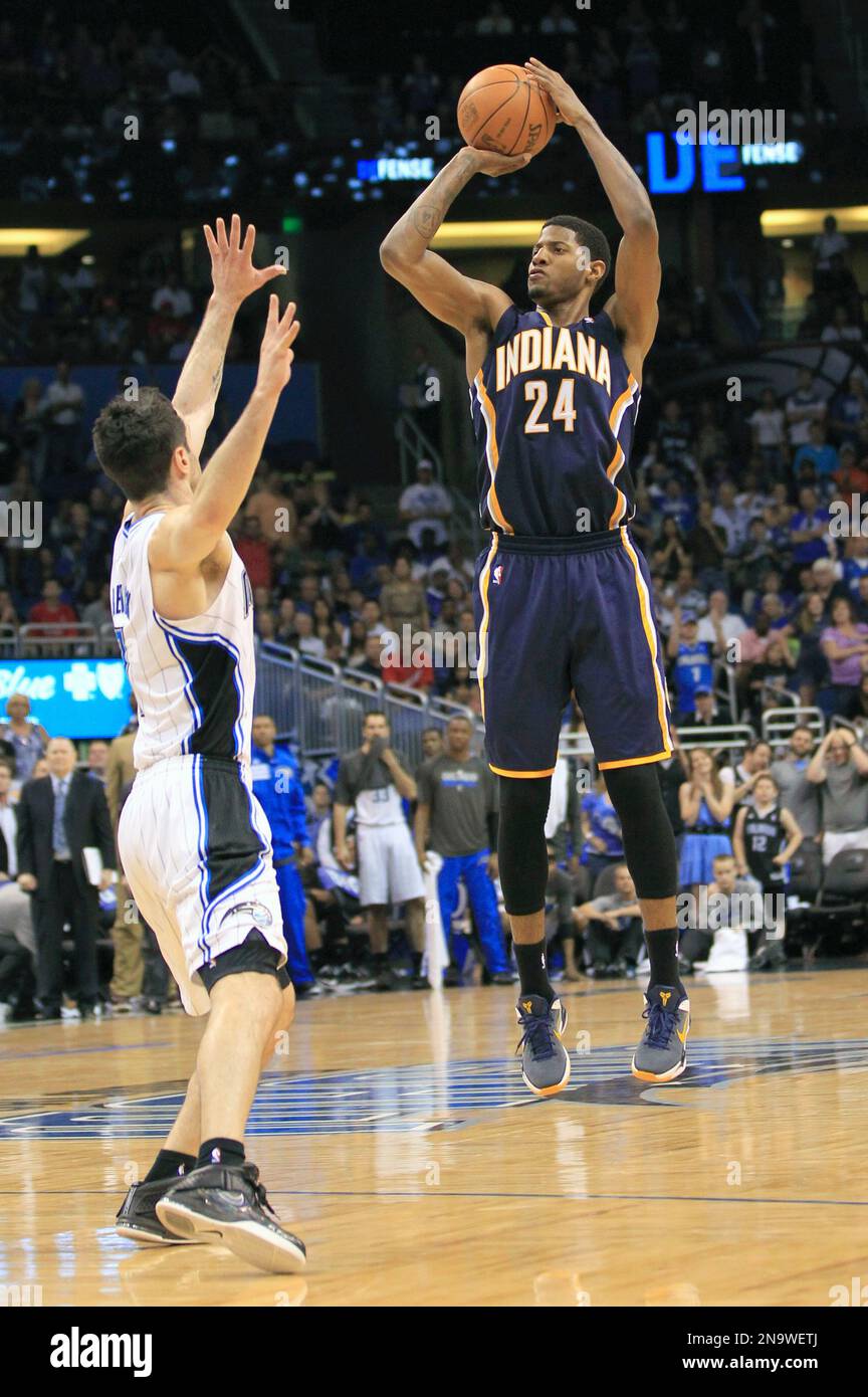 Indiana Pacers' Paul George (24) takes a jump shot over Orlando Magic's J.J. Redick during the second half of Game 4 of an NBA first-round playoff basketball series, Saturday, May 5, 2012, Indiana Pacers' Paul George (24) takes a jump shot over Orlando Magic's J.J. Redick during the second half of Game 4 of an NBA first-round playoff basketball series, Saturday, May 5, 2012,
