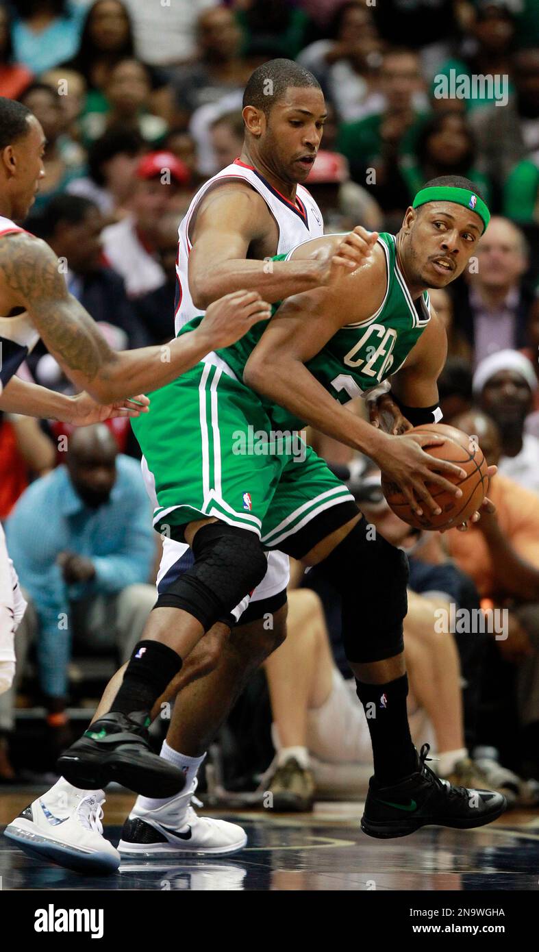 Boston Celtics small forward Paul Pierce (34) is covered by Atlanta