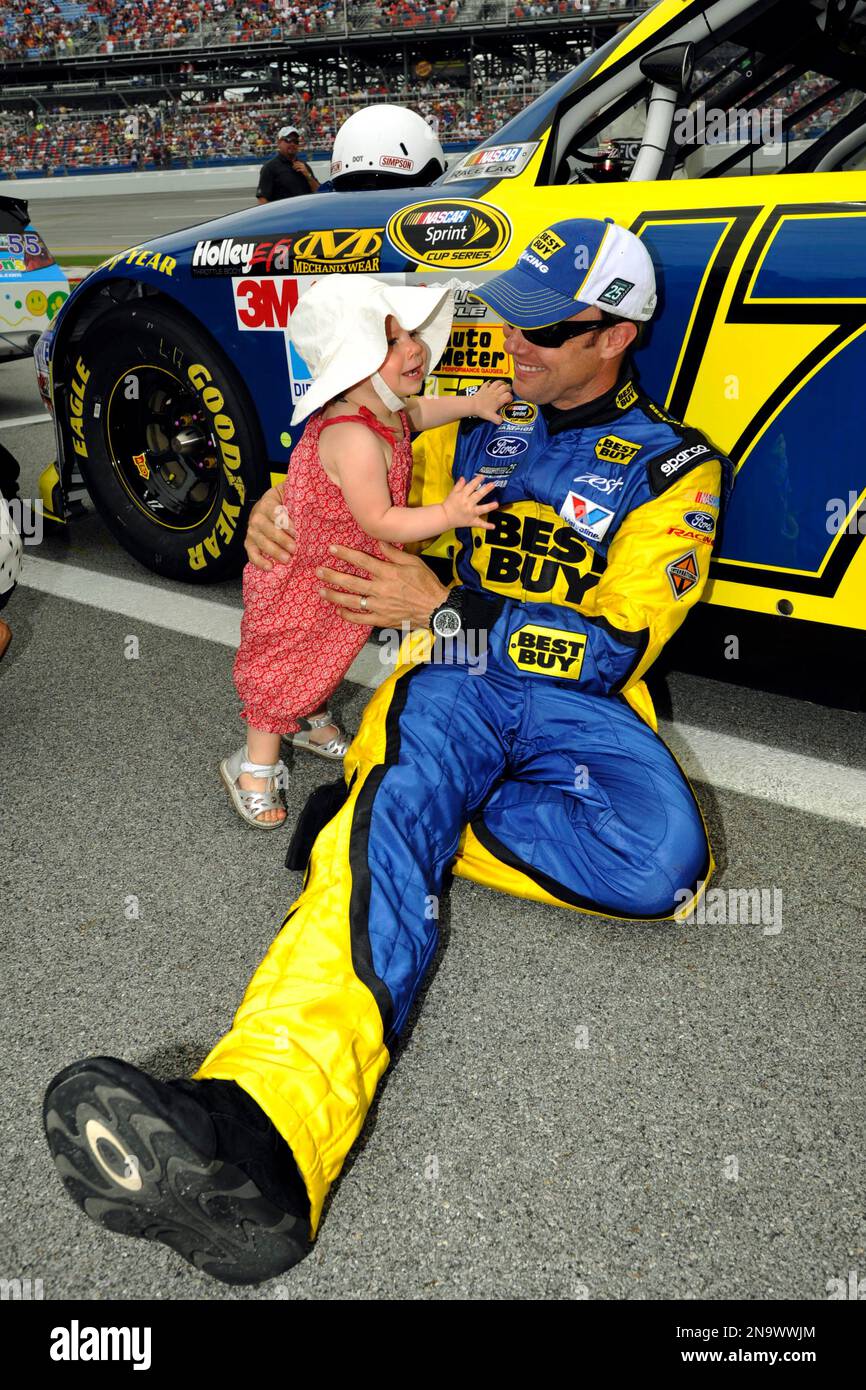 Matt Kenseth (17) plays with his daughter Kaylin before the start of