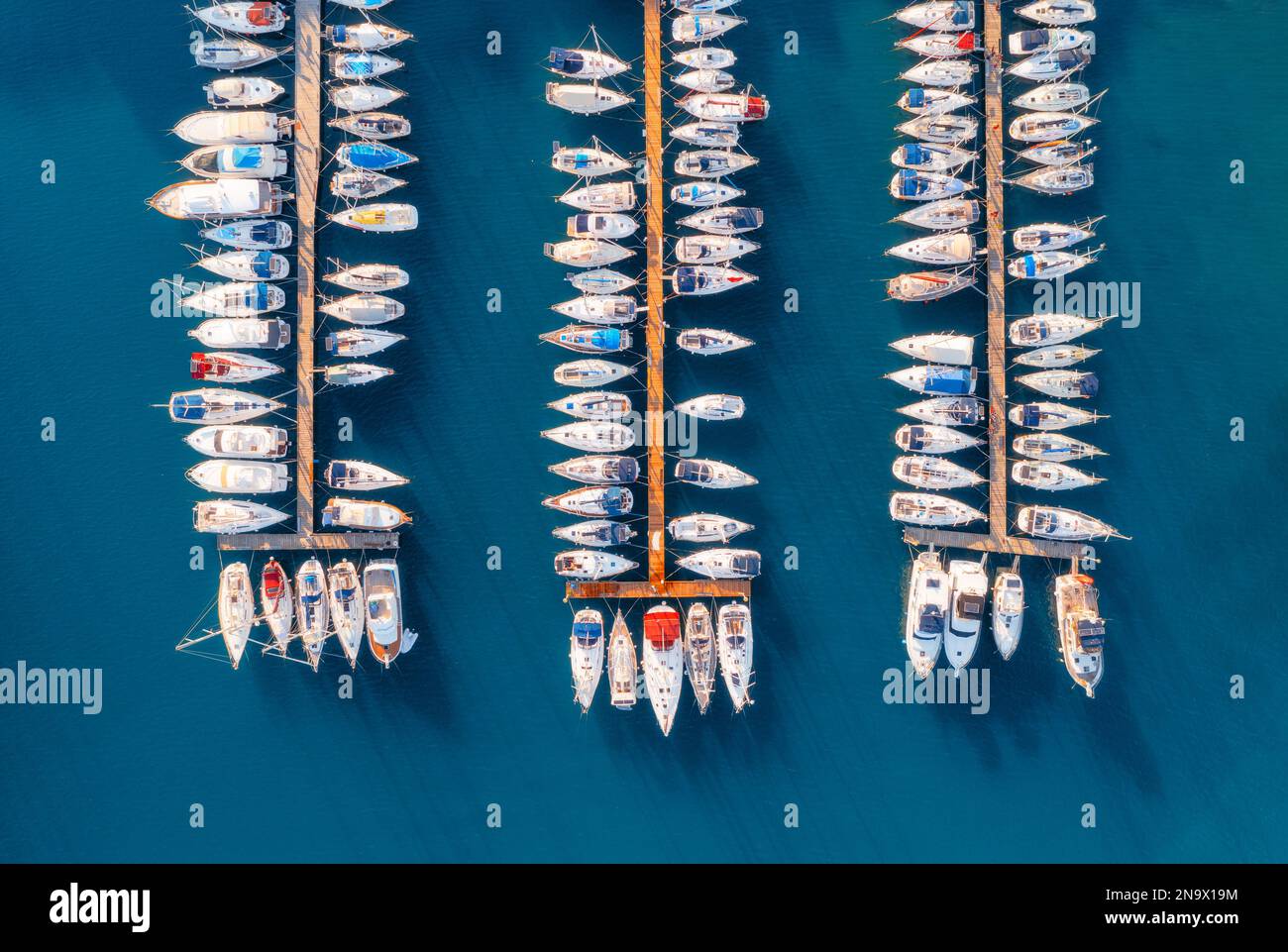Aerial view of boats and yachts in dock at sunset in summer Stock Photo ...