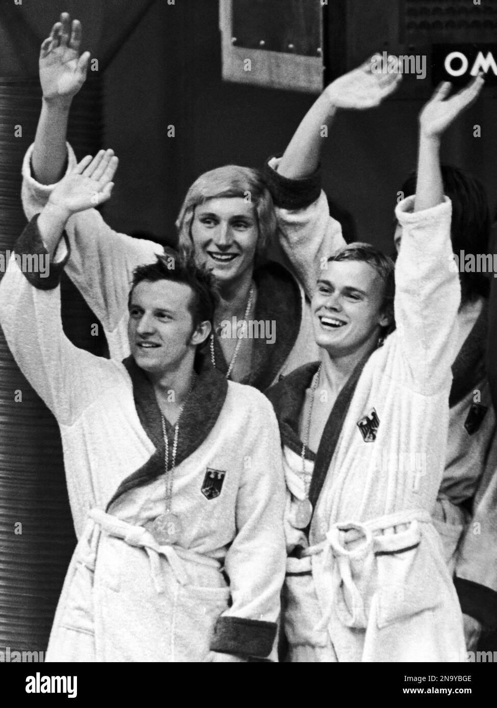 The West German team from left to right: Klaus Steinbach, Werner Lampe,  Hans-Guenther Vosseler (partly hidden) and Hans-Joachim Fassnacht, silver  medal winners of the Men's 4 x 200 meter freestyle relay Summer