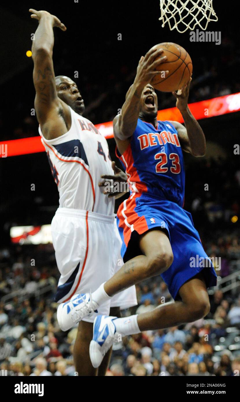 Detroit Pistons guard Walker Russell (23) shoots as Atlanta Hawks