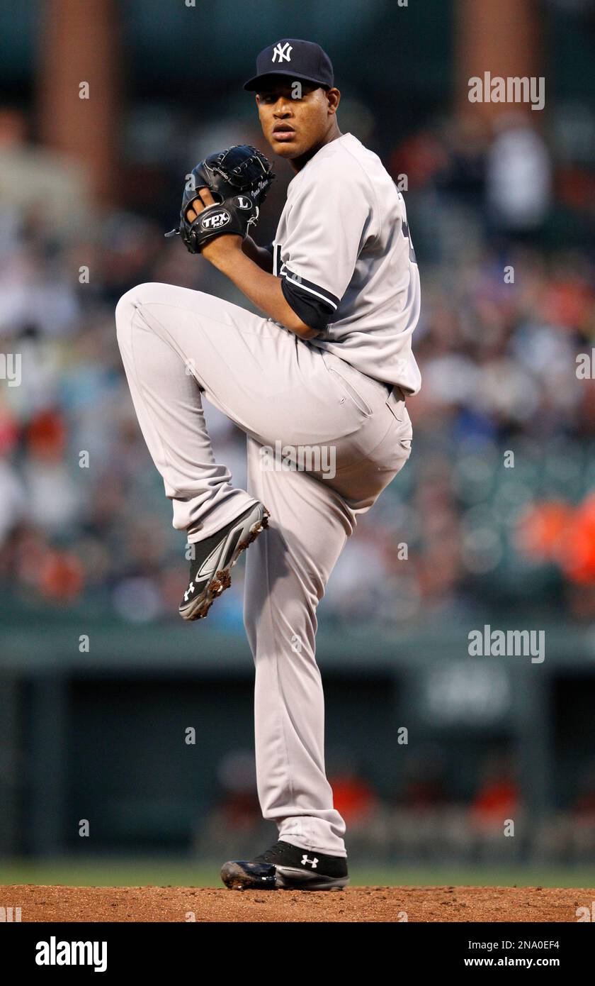 New York Yankees starting pitcher Ivan Nova throws against the