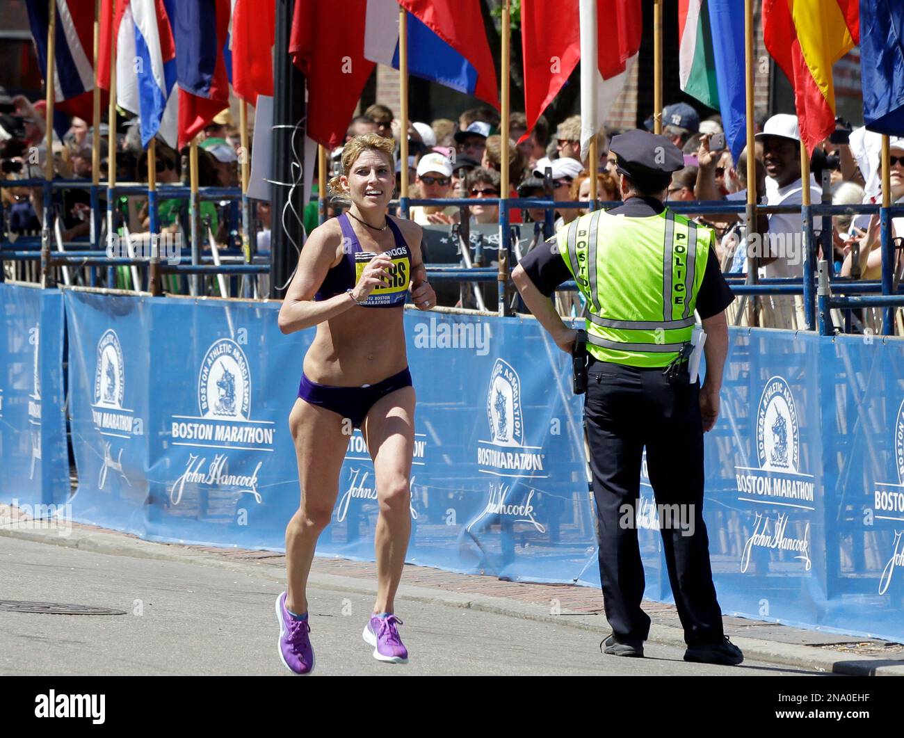 Top USA women's finisher, Sheri Piers, approaches the finish line of