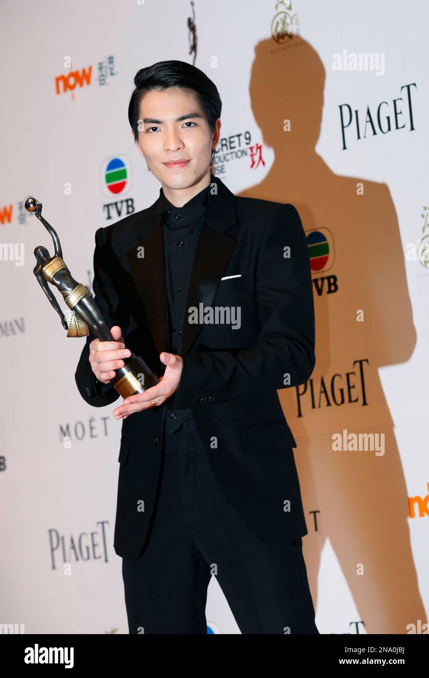 Taiwan actor Jam Hsiao poses after winning Best New Comer award for his role in the movie 'The