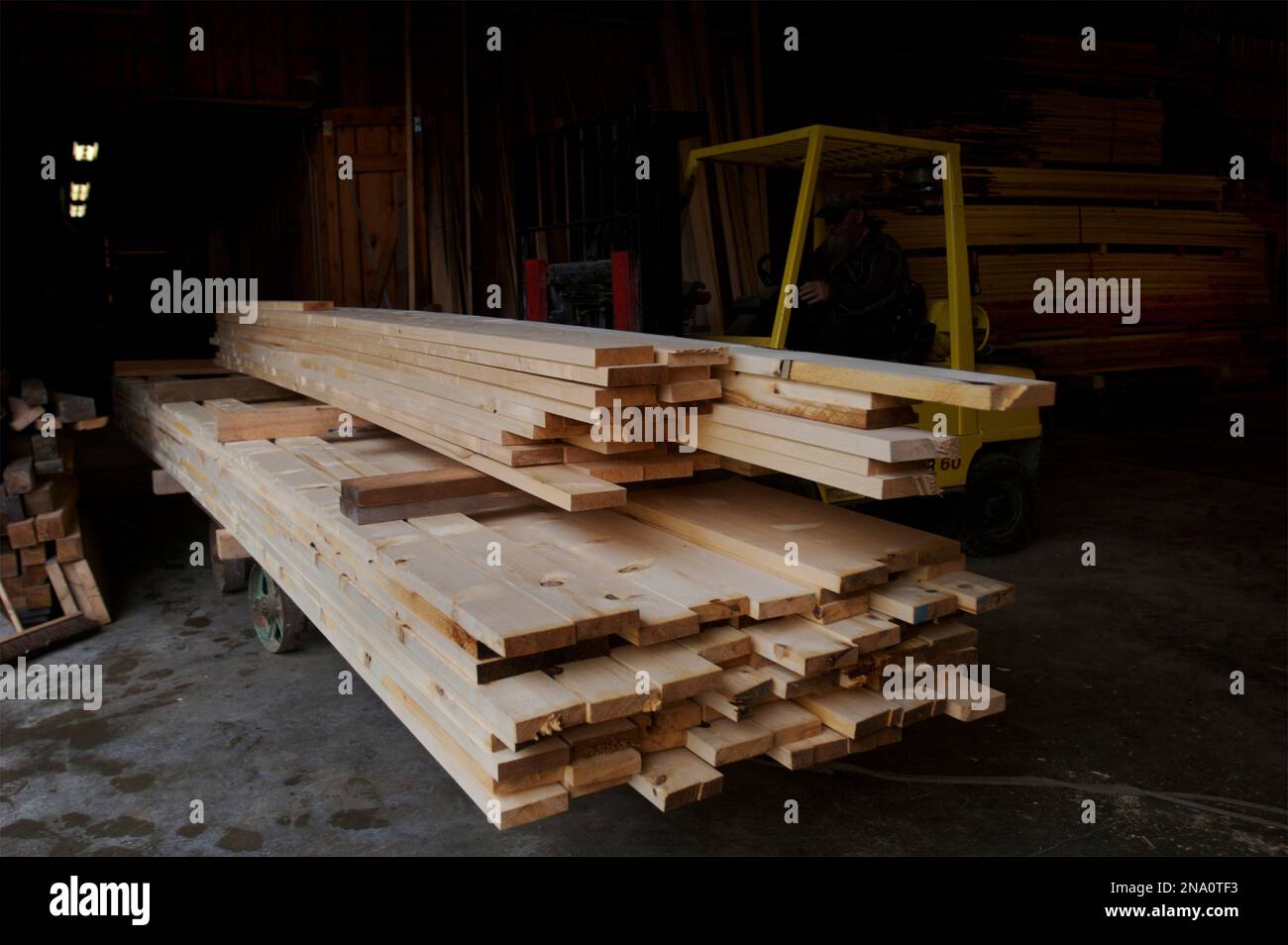 Stacked planed wood in a sawmill; Prince of Wales Island, Alaska, United States of America Stock Photo