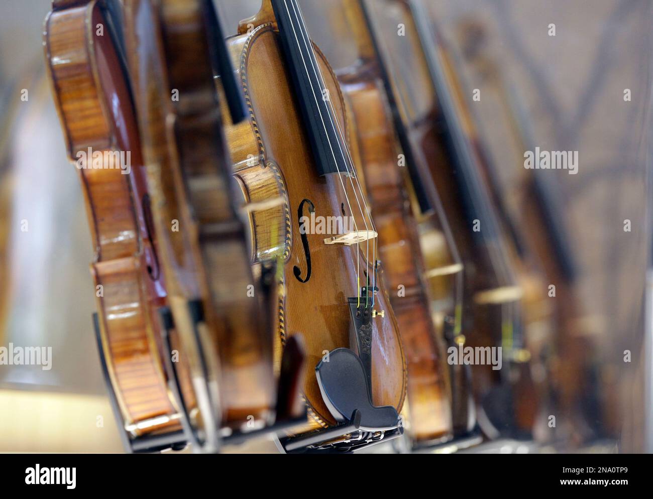 In this April 9, 2012 photo, violins are shown on display at the