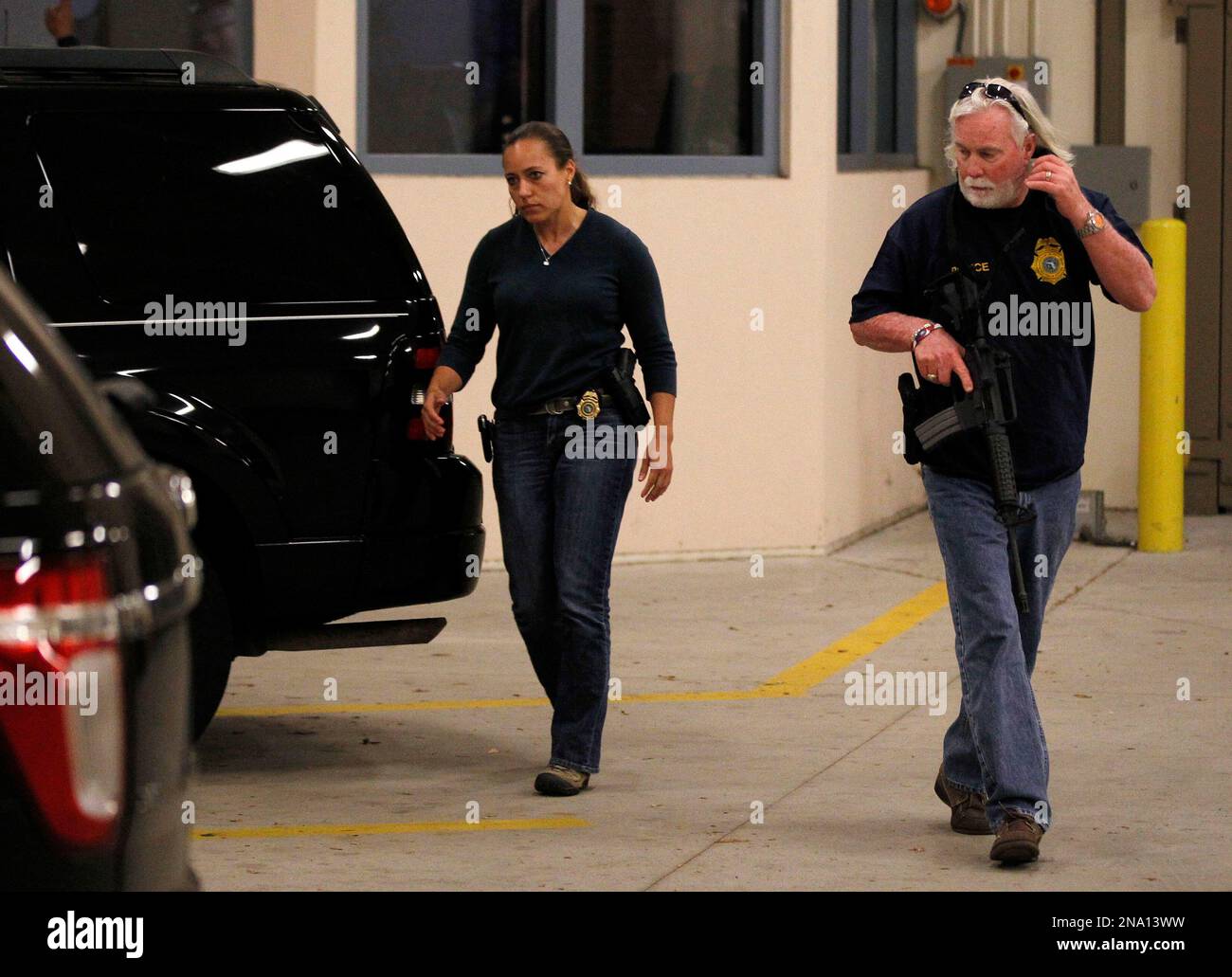 Agents with the Florida Dept. of Law Enforcement head back to their