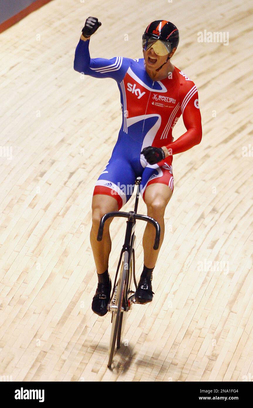 Britain s Chris Hoy celebrates after winning the men s keirin at the Track Cycling World Championships in Melbourne Australia Sunday April 8 2012. AP Photo Rick Rycroft Stock Photo Alamy