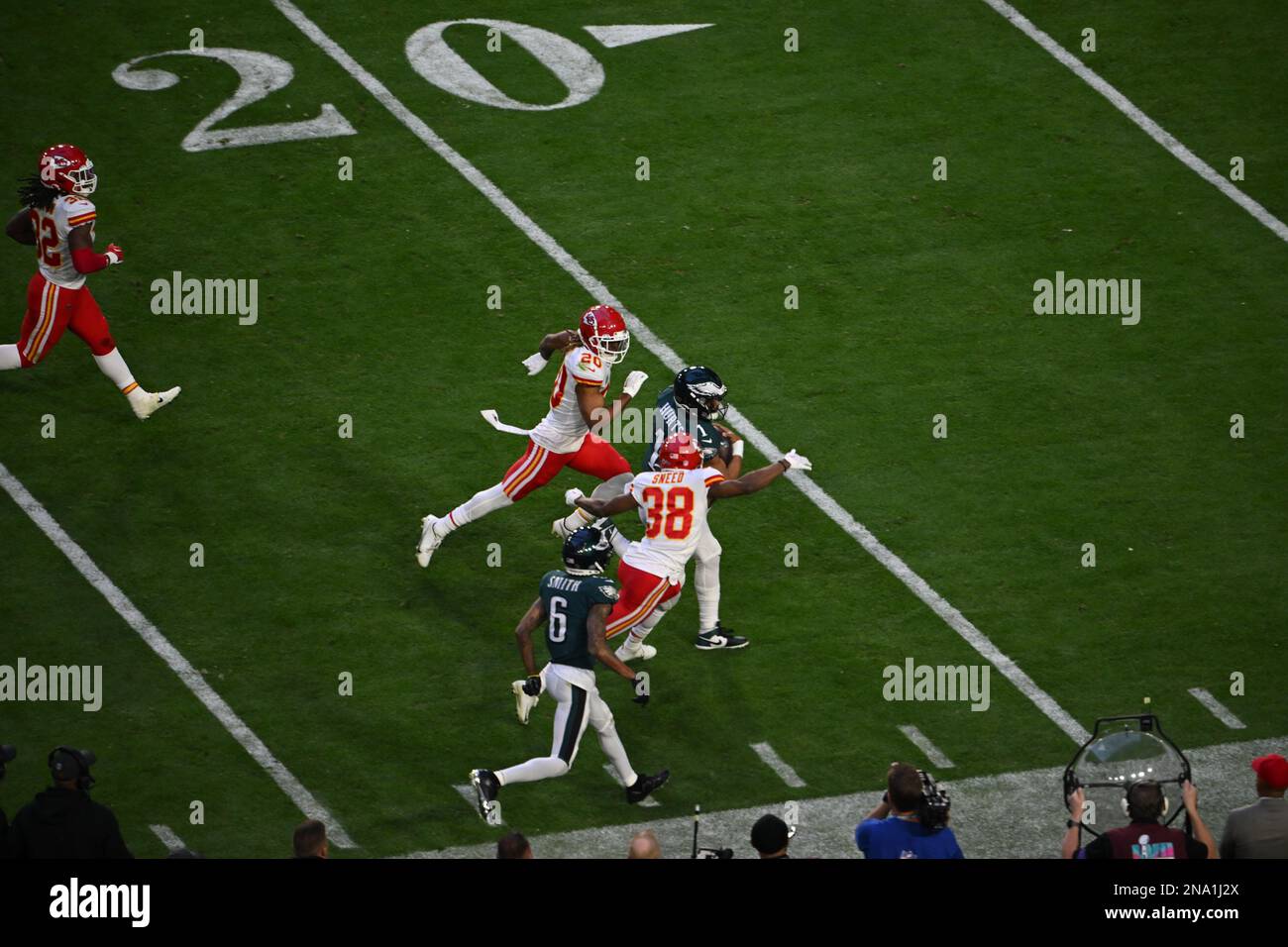 Philadelphia, United States. 28th Jan, 2023. San Francisco 49ers linebacker  Dre Greenlaw (57) pushes Philadelphia Eagles quarterback Jalen Hurts (1)  out of bounds in the third quarter in the NFC Championship Game