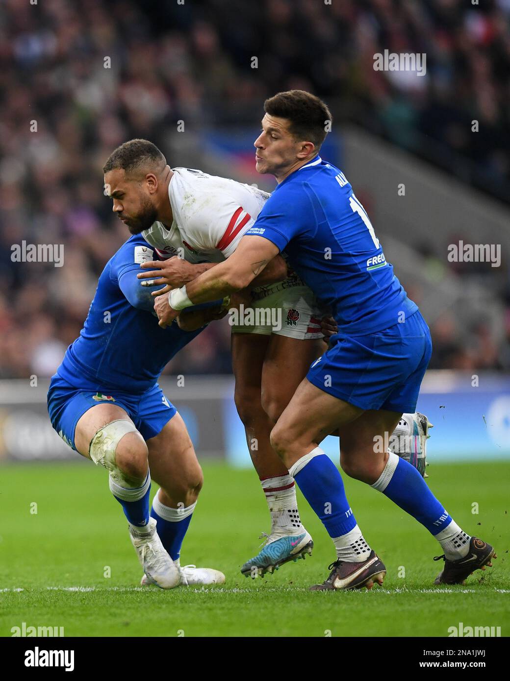 2023 Guinness Six Nations, Twickenham Stadium, England, UK. 12th February, 2023. England's Ollie Lawrence is tackled by Italy's Tommaso Allan (r) during the 2023 Guinness Six Nations match between England and Italy: Credit: Ashley Western/Alamy Live News Stock Photo