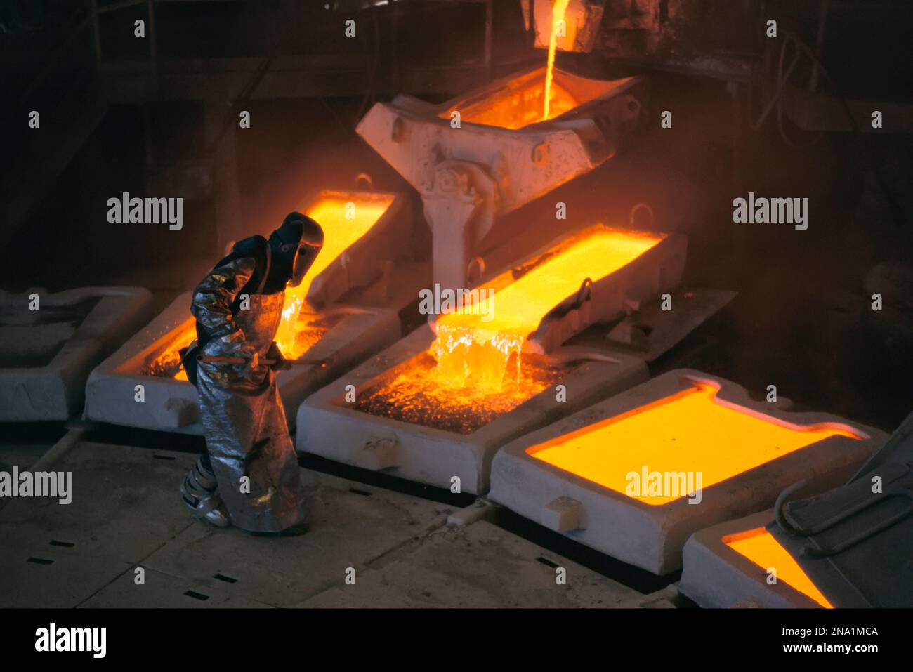 Molten copper is poured into molds at Chuquicamata Copper Refinery; Atacama Desert, Chile Stock Photo