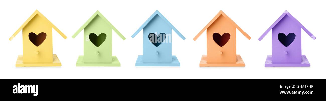 Set with different colorful bird houses on white background, banner design Stock Photo