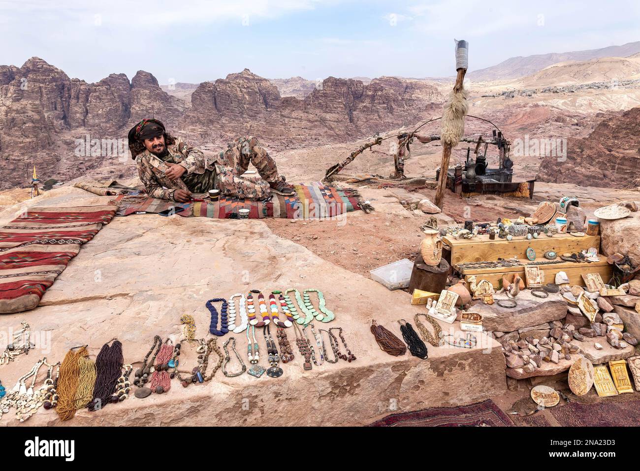 A Bedouine sells local handmade souvenirs in Petra, a famous