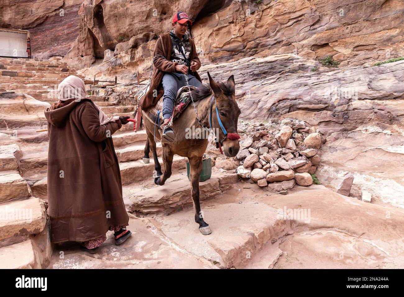 Bedouins work in Petra, a famous archaeological site. Petra is a UNESCO