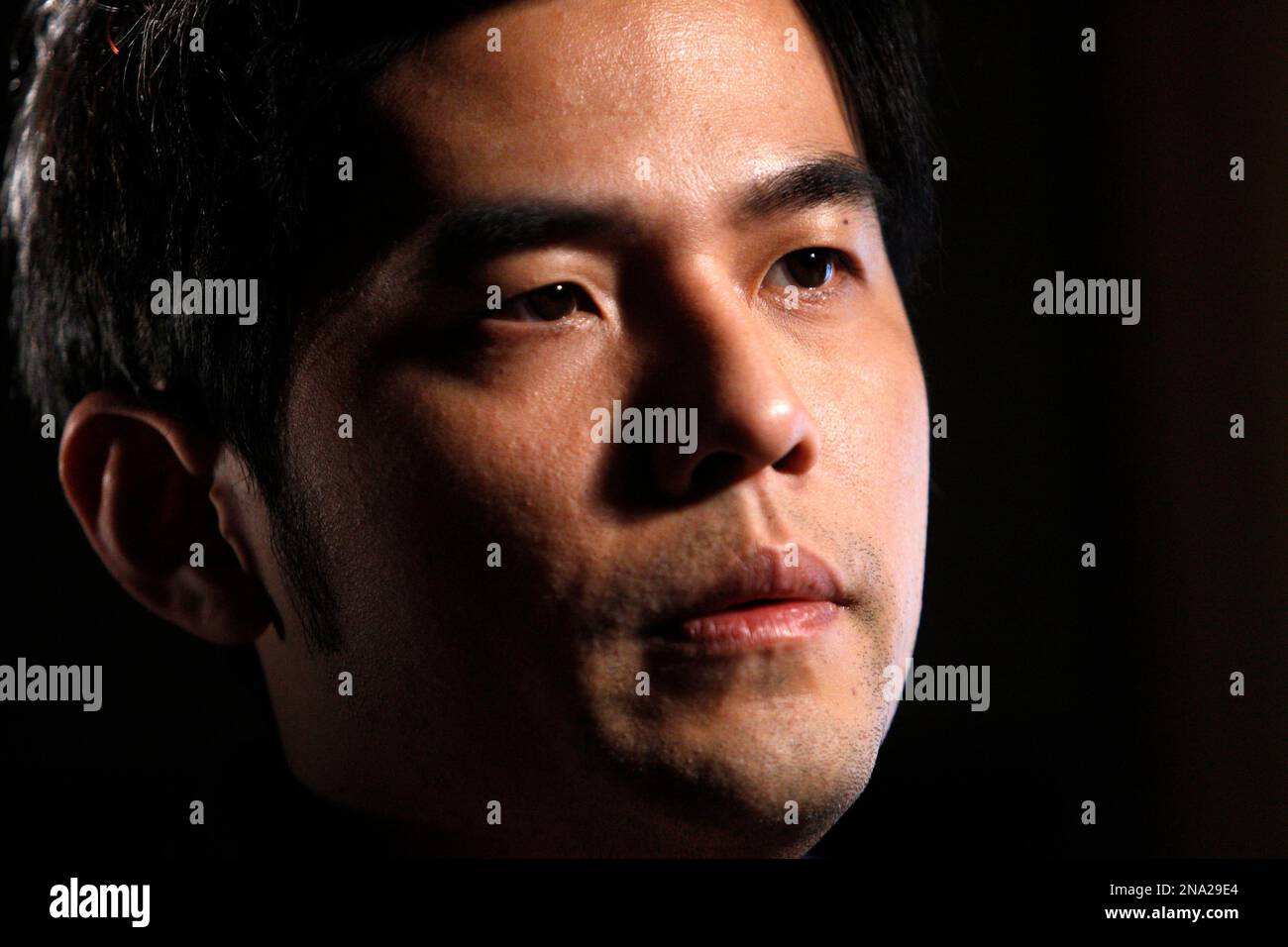 In this Dec. 1, 2011 image, Taiwan pop king Jay Chou pauses during an  interview in his studio in Taipei, Taiwan. Chou stepped up his fight with  paparazzi, calling them 