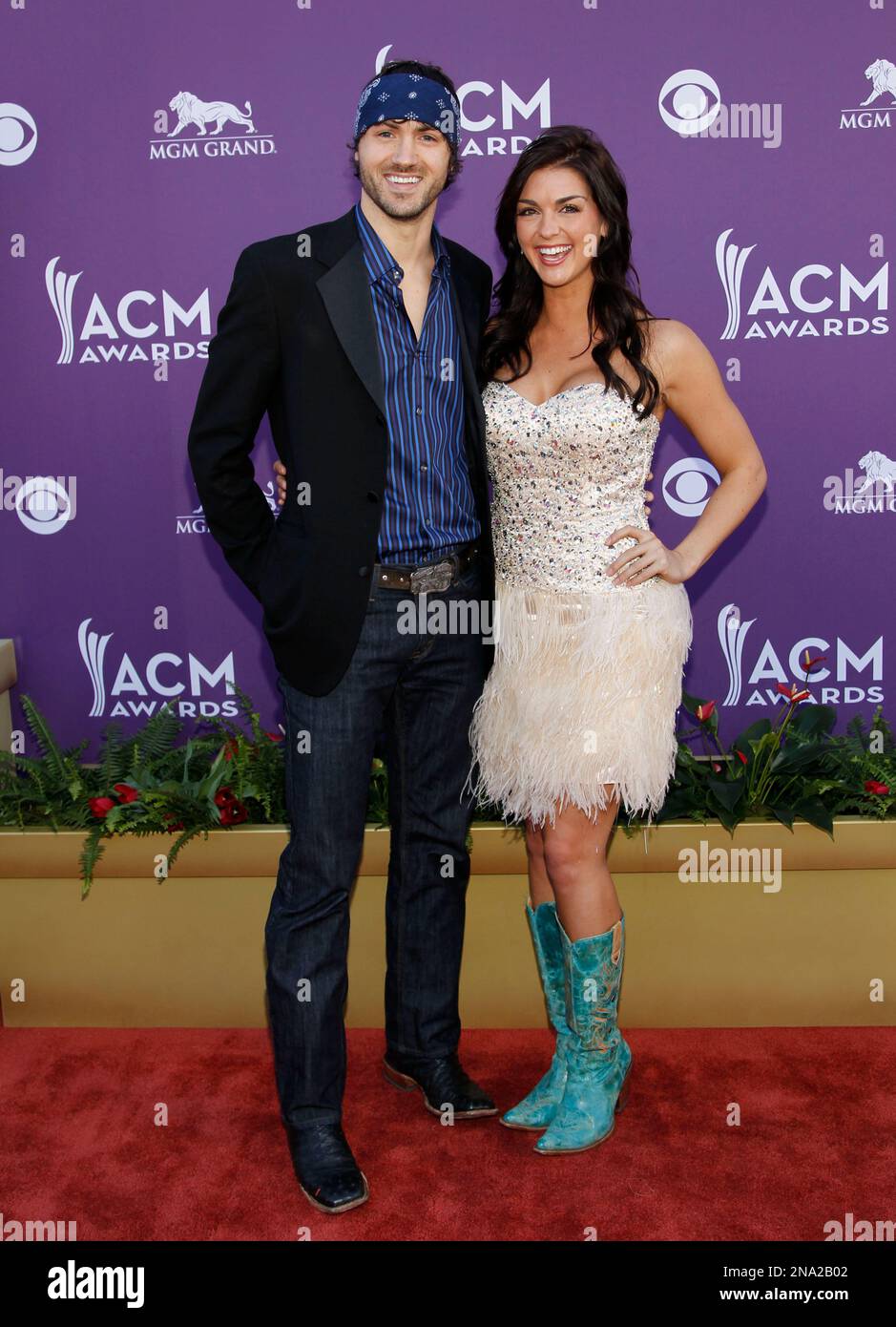 Jeremiah James Korfe, left, and Paige Duke arrive at the 47th Annual