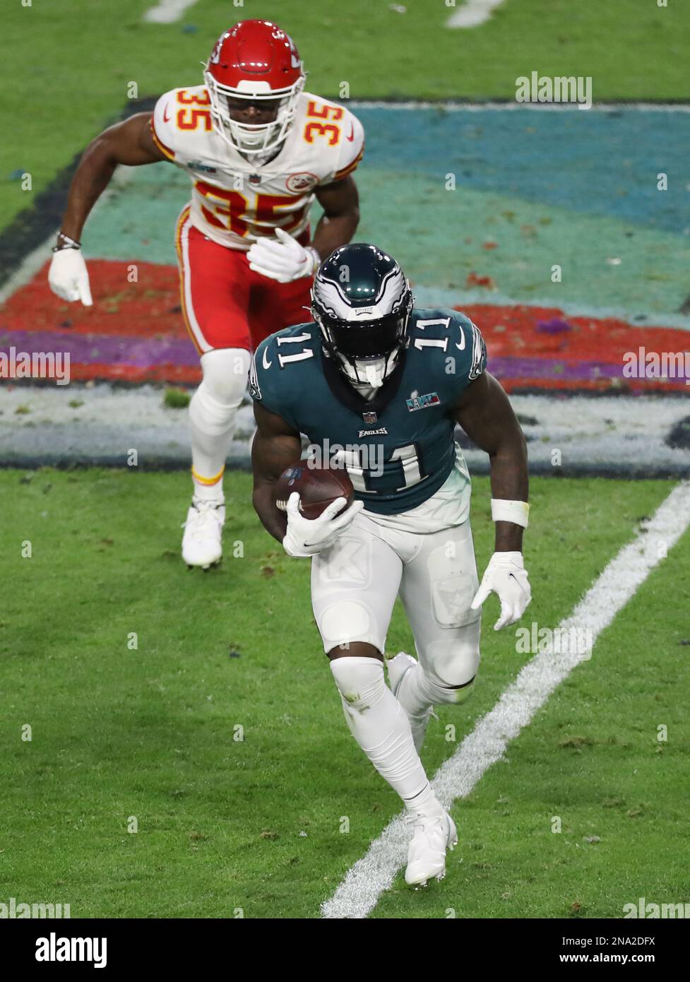 Glendale, United States. 12th Feb, 2023. Philadelphia Eagles wide receiver A.J. Brown (11) is chased by Kansas City Chiefs cornerback Jaylen Watson (35) in the second quarter in Super Bowl LVII at State Farm Stadium in Glendale, Arizona on Sunday, February 12, 2023. Photo by Aaron Josefczyk/UPI. Credit: UPI/Alamy Live News Stock Photo