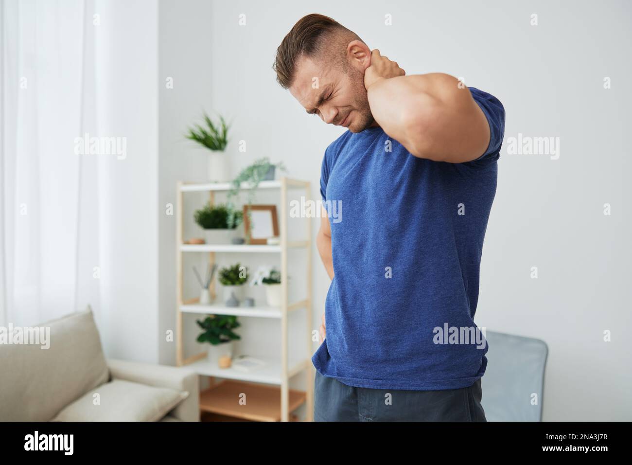 Man back neck and shoulder pain, inflammation of muscles and ligaments