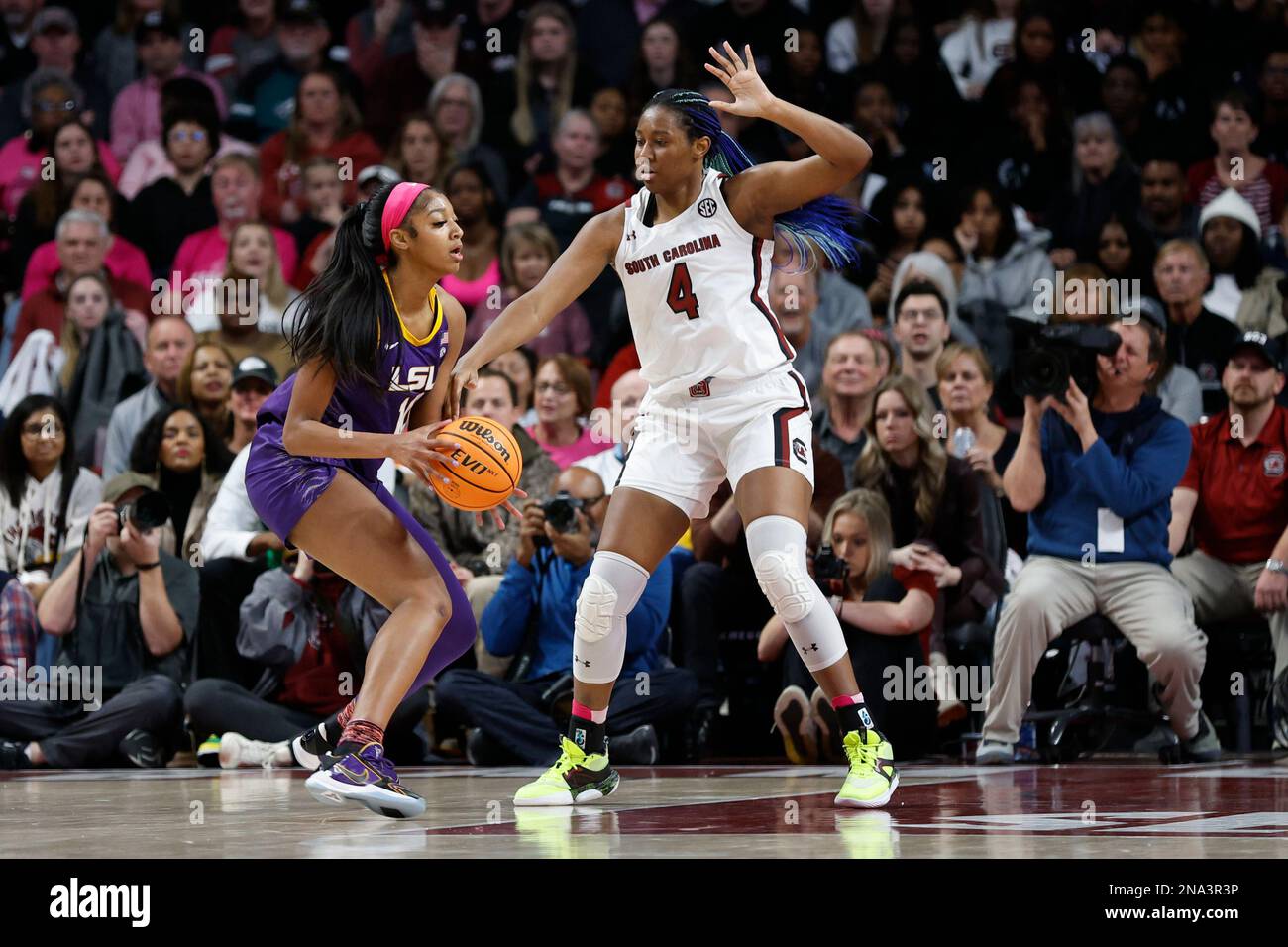 LSU Forward Angel Reese, Left, Looks To Pass Against South Carolina ...