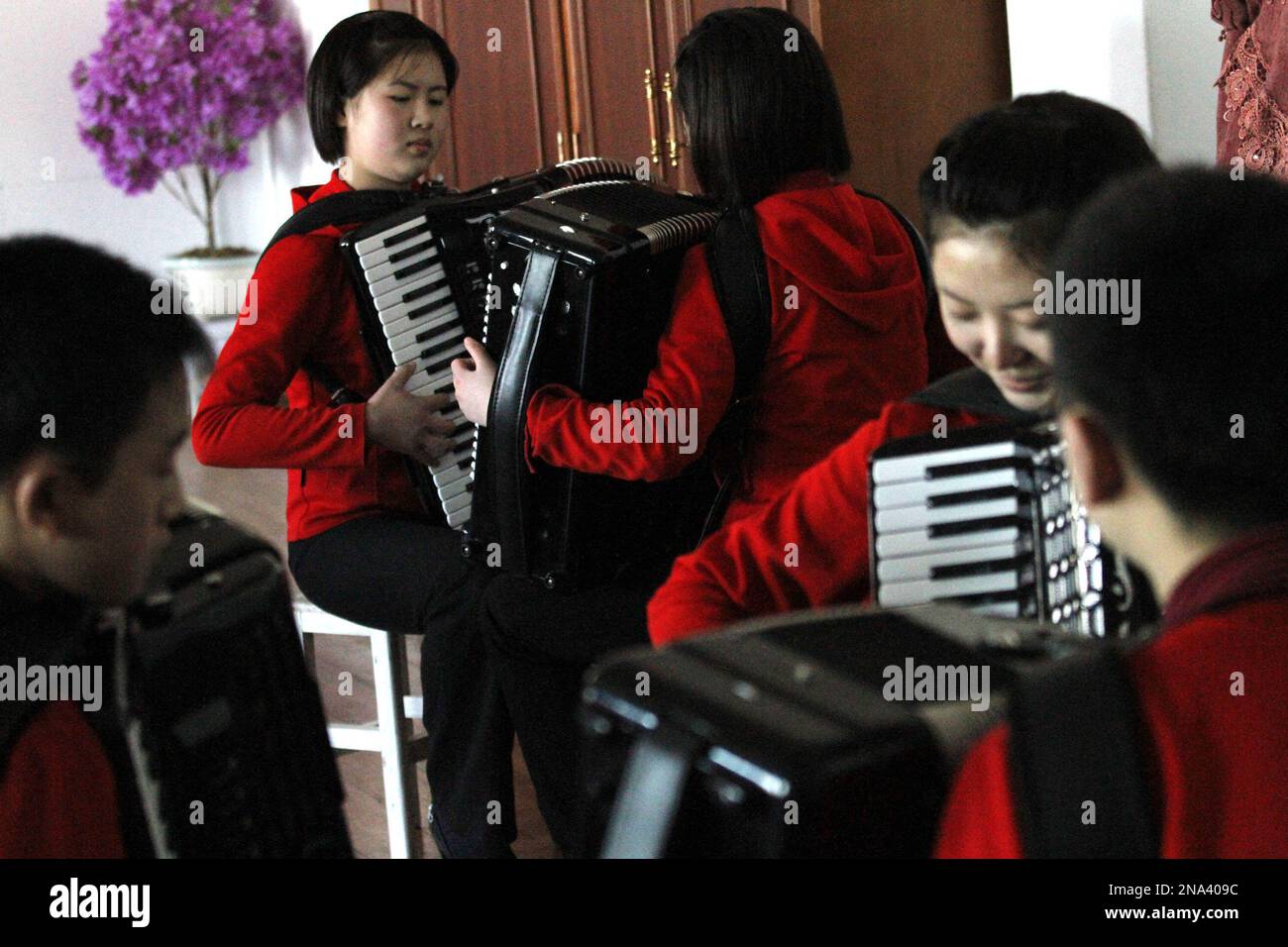 In this Feb. 25, 2012 photo, students rehearse with accordions in a