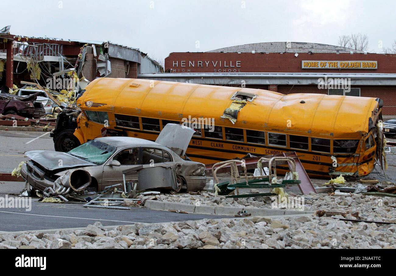 FILE In this March 3, 2012, file photos vehicles damaged by a tornado