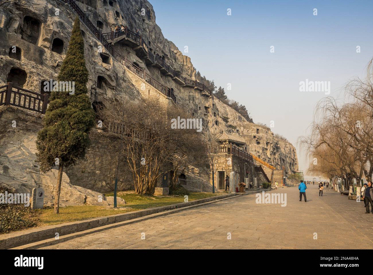 The Longmen Caves, some of the finest examples of Chinese Buddhist art housing tens of thousands of statues of Buddha and his disciples, Luoyang, Hena Stock Photo