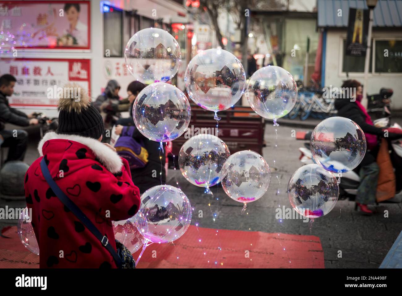 Plastic balloons for sale in Luoyang Old Town District,  Henan Province, China © Dosfotos/Axiom Stock Photo