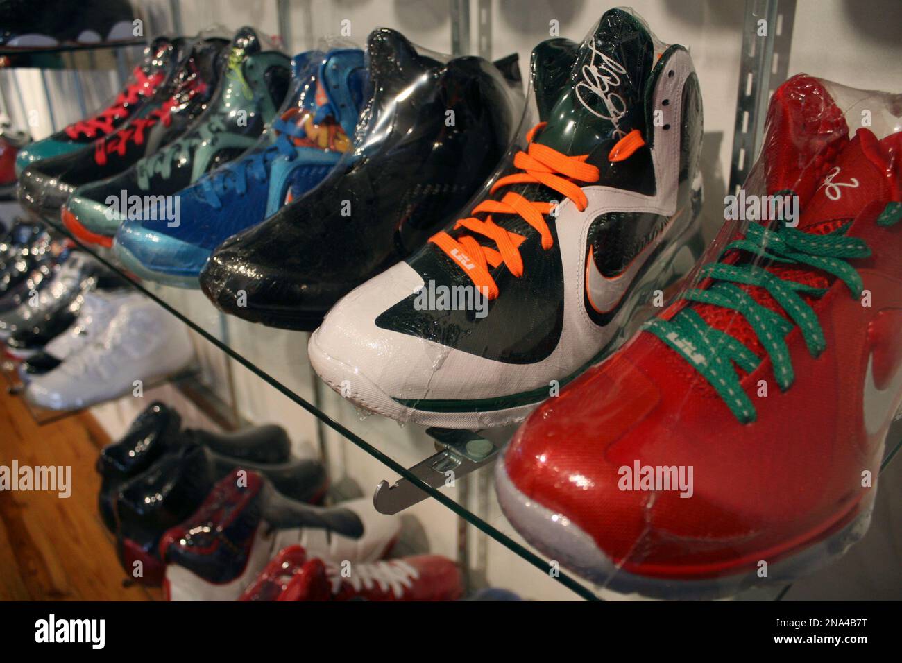 In this photo taken Feb. 28, 2012, limited edition sneakers, wrapped in plastic to protect them