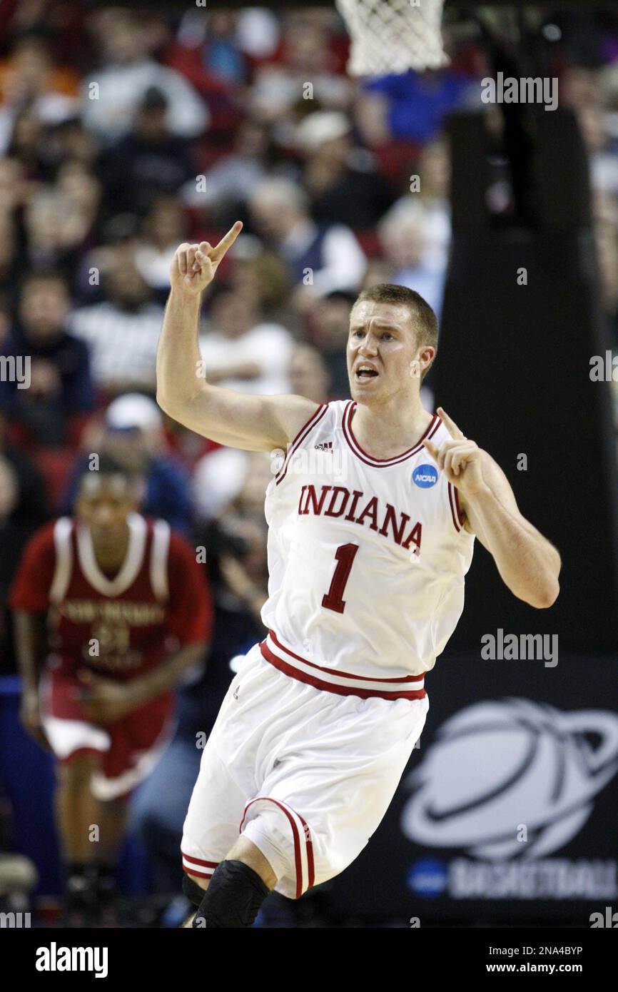 Indiana's guard Jordan Hulls (1) runs up court after scoring against