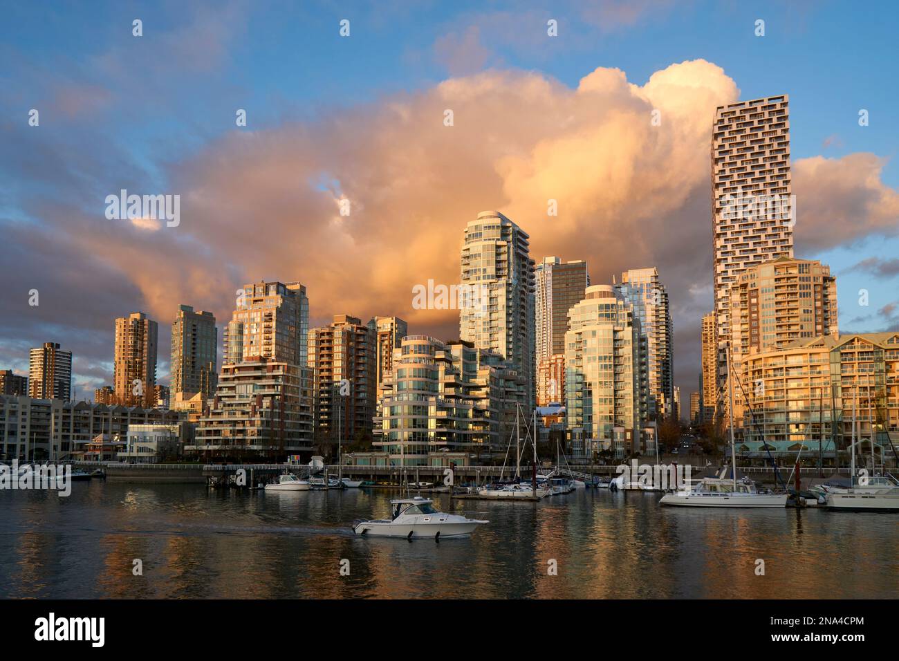 False Creek residential towers and False Creek at sunset, Vancouver, BC