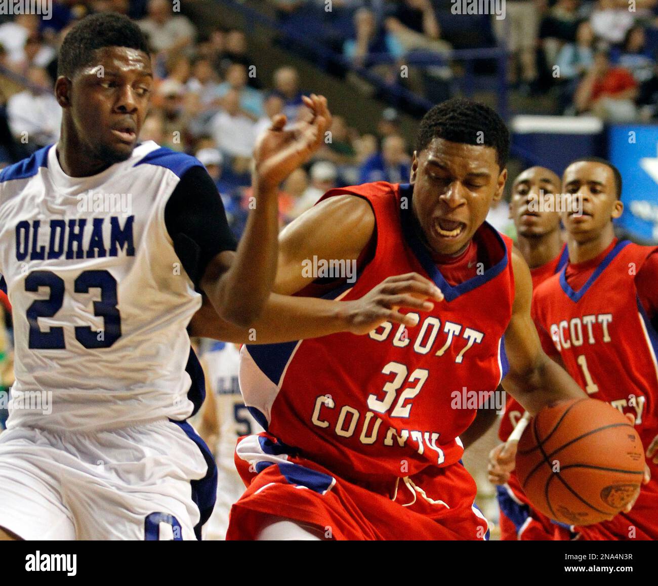 Scott County's Tamron Manning (32) looks for an opening against Oldham