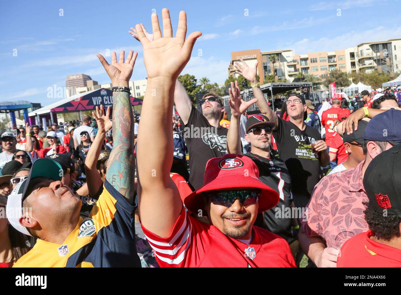 Rally towels are thrown to the fans attending the Official Super Bowl