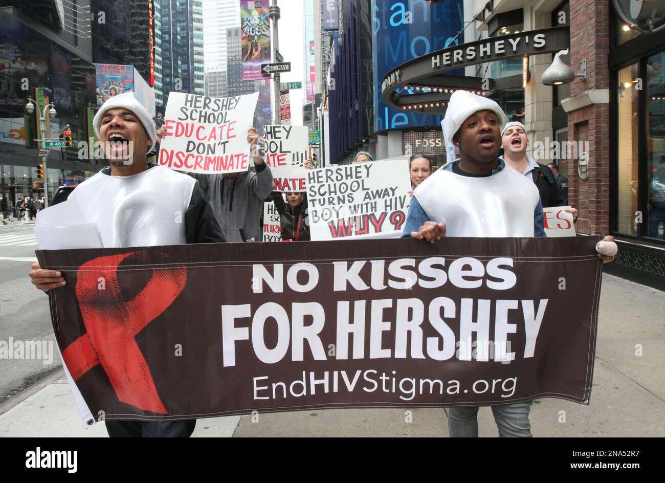 HIV activists protest outside the Hershey's store in New York's Times ...