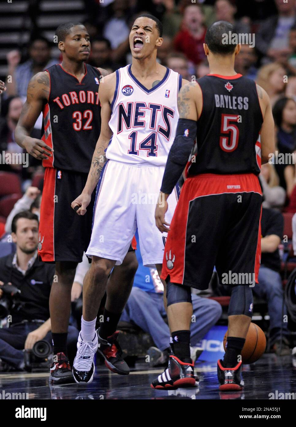 New Jersey Nets' Gerald Green (14) tries to block a shot by Miami Heat's  LeBron James (6) during the first half of a NBA basketball game in Miami,  Tuesday, March 6, 2012. (