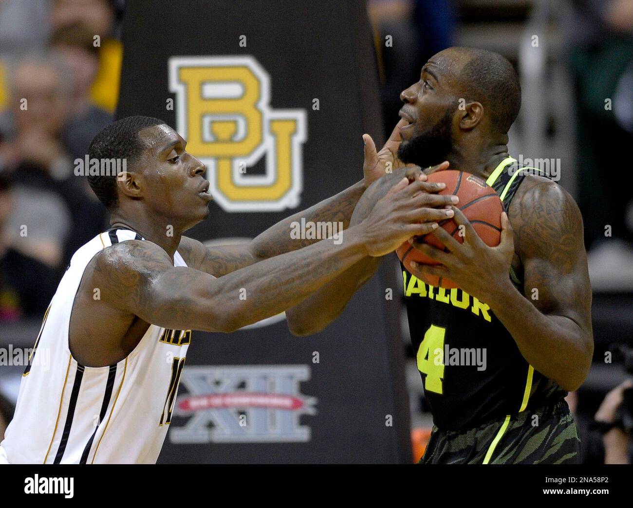 Missouri Tigers forward Ricardo Ratliffe (10) pressures Baylor forward 