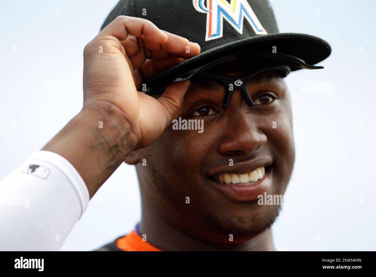 Miami Marlins' Hanley Ramirez walks off the field between innings ...