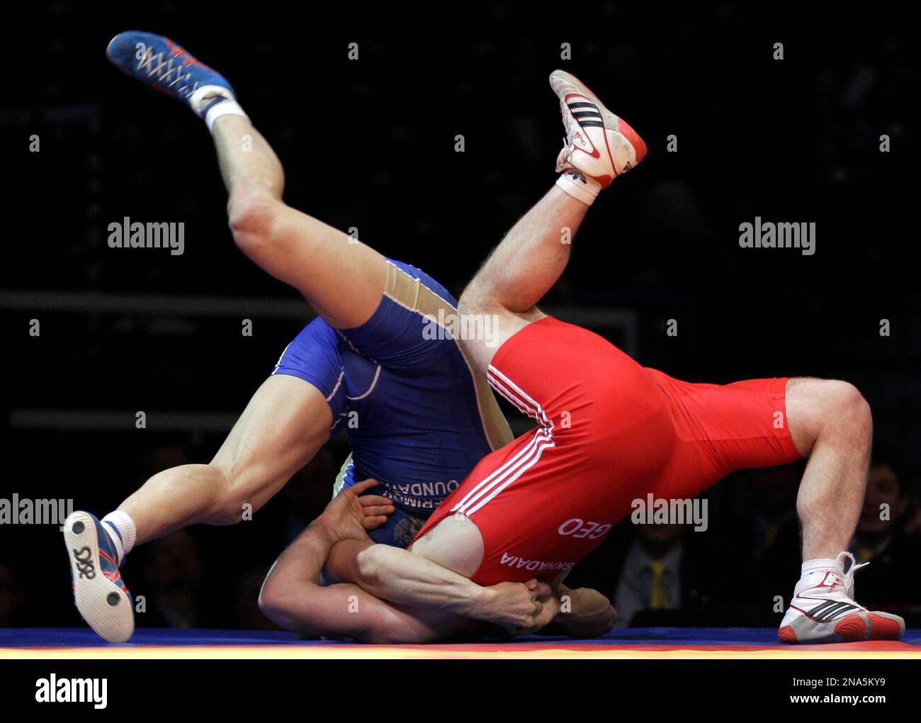 Manuchar Tskhadaia, right, fights with Russia's Roman Vlasov