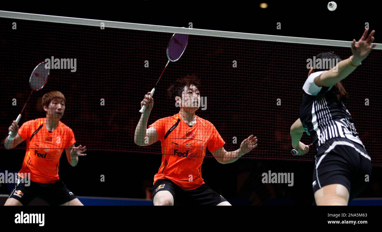 Chinas Yang Yu, centre, and Xiaoli Wang watch a shot during their womens doubles final loss to compatriots Qing Tian and Yunlei Zhao, at The All England Open Badminton Championships, in Birmingham,