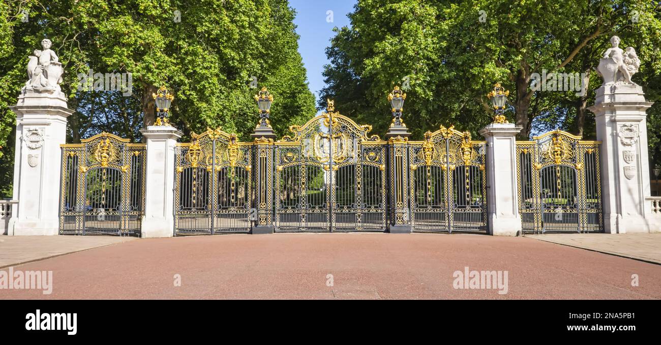 Ornate and decorative gates to Buckingham Palace; London, England Stock Photo