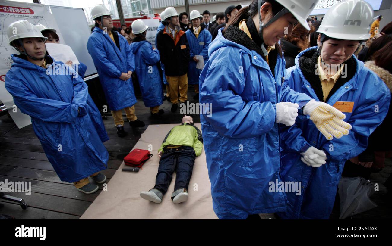 Participants assemble before the start of an anti-disaster drill in ...