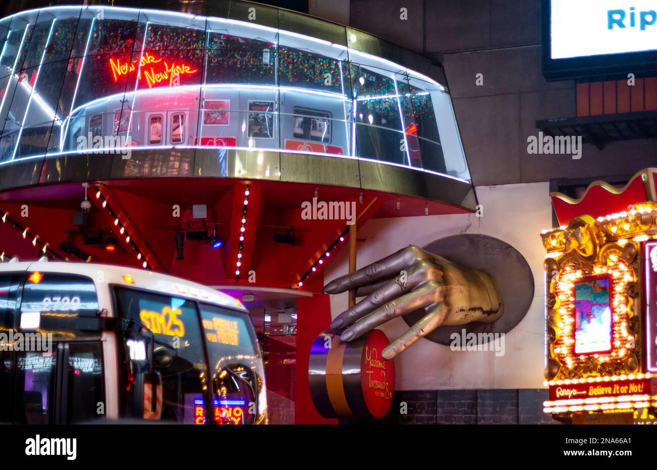 Hand sculpture and sign outside Madame Tussauds Wax Museum, Manhattan