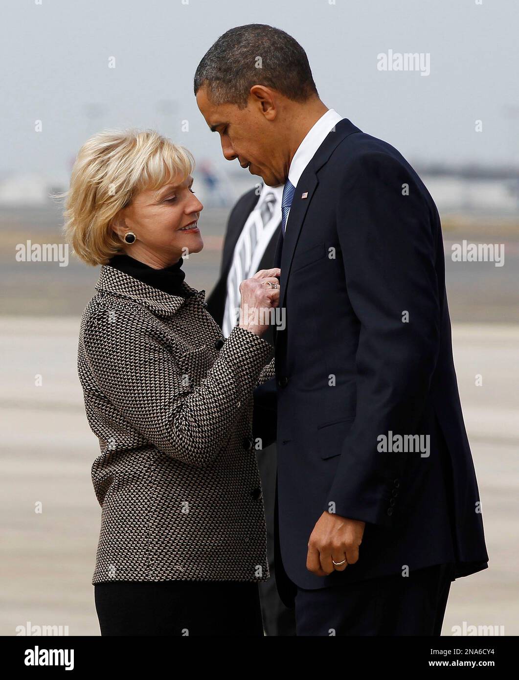 President Barack Obama is greeted by North Carolina Gov. Bev Perdue ...